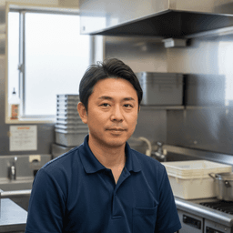 藤田店長(回転寿司チェーン店長のポートレート写真)